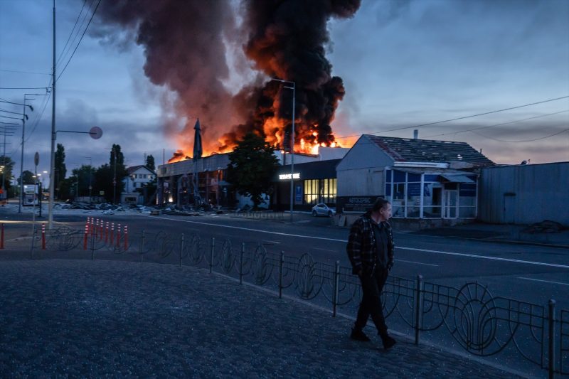 Europapress 7566656 02 June 2026 Ukraine Kiev Man Walks Pass By Burning Building After Russian