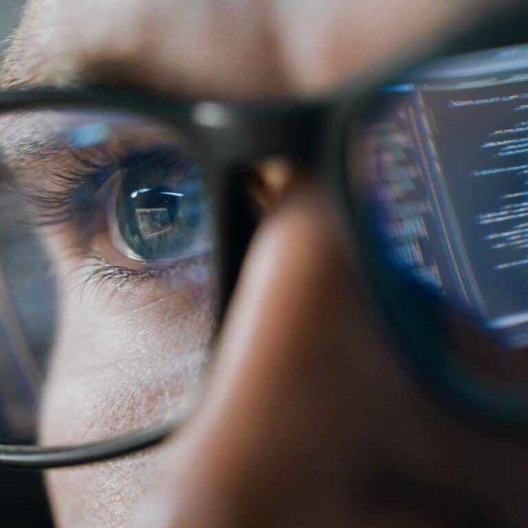 Close Up Portrait Of Software Engineer Working On Computer 768×768